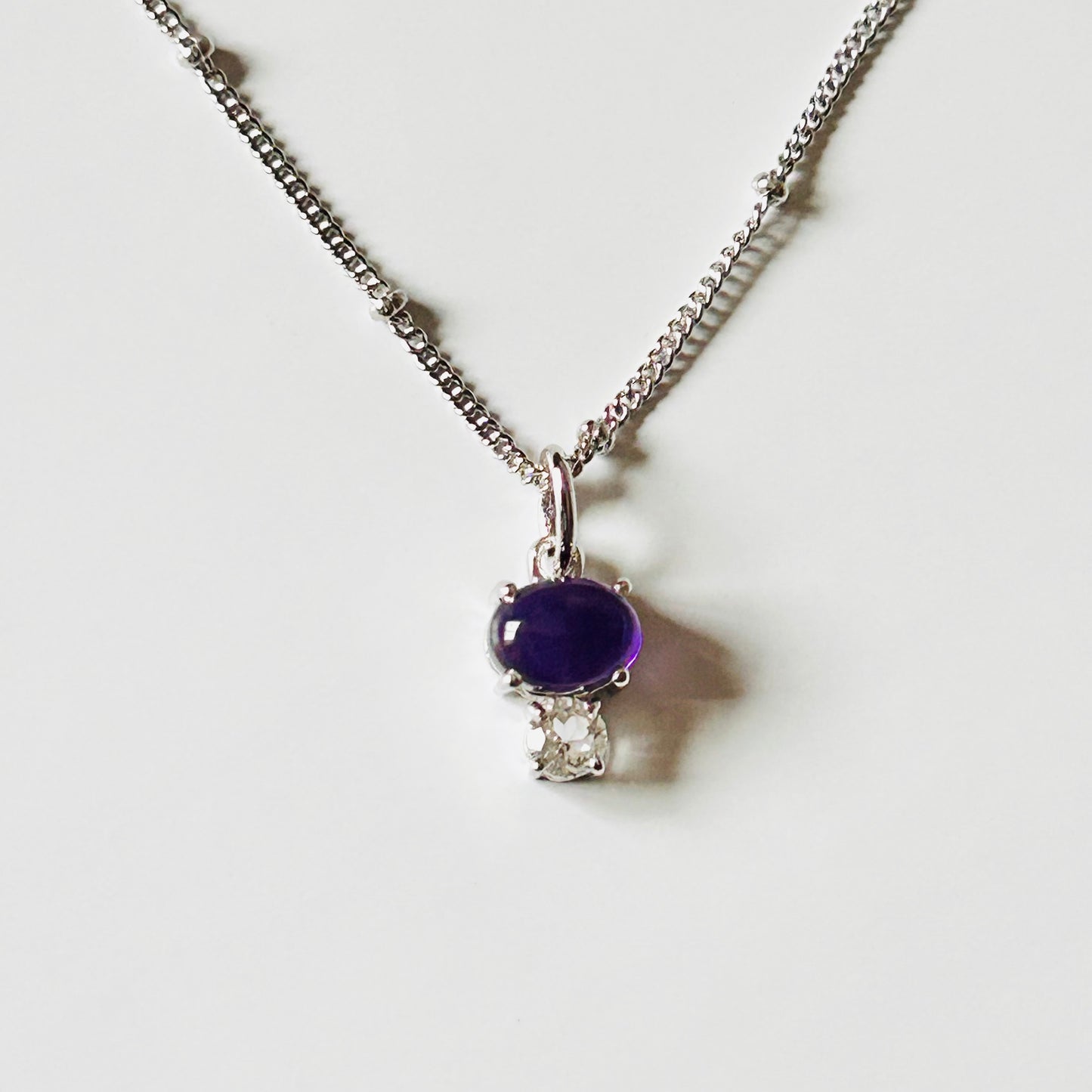 Ädelsten Amethyst and White Topaz