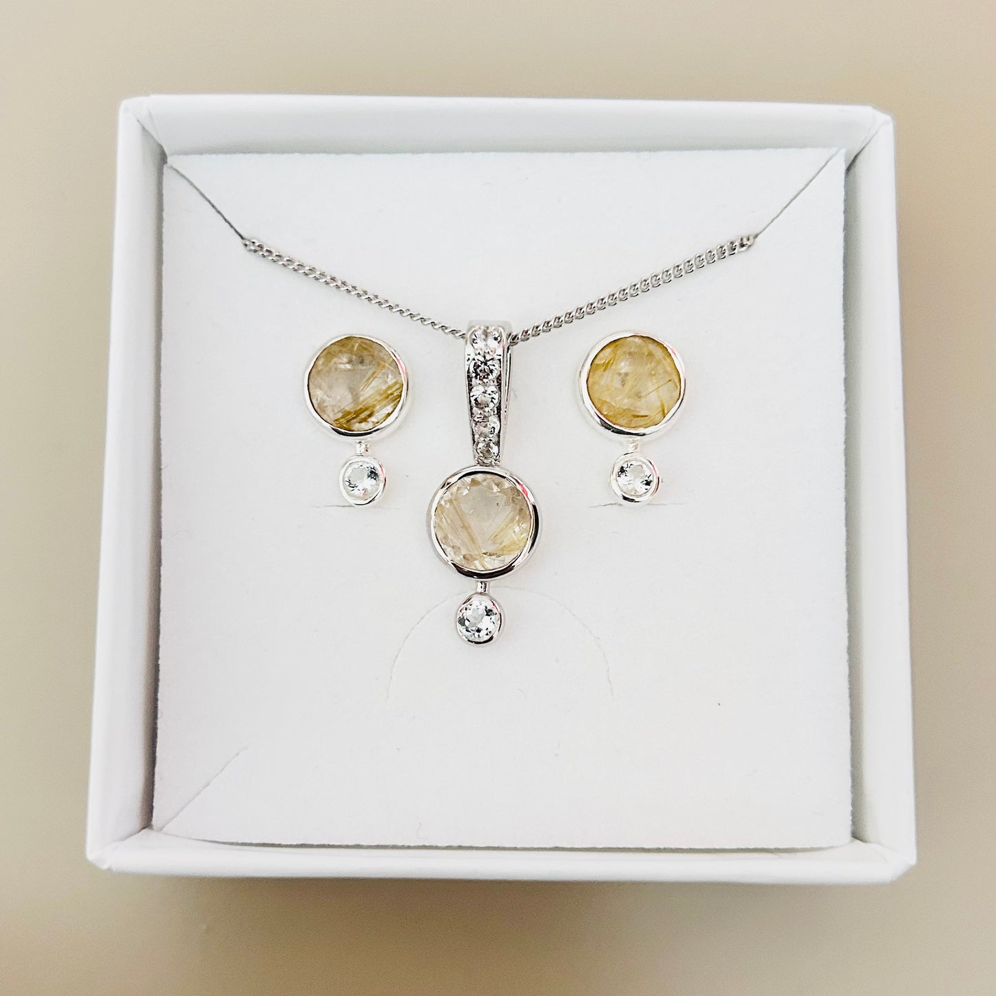 Ädelsten Golden Rutile Quartz and White Topaz